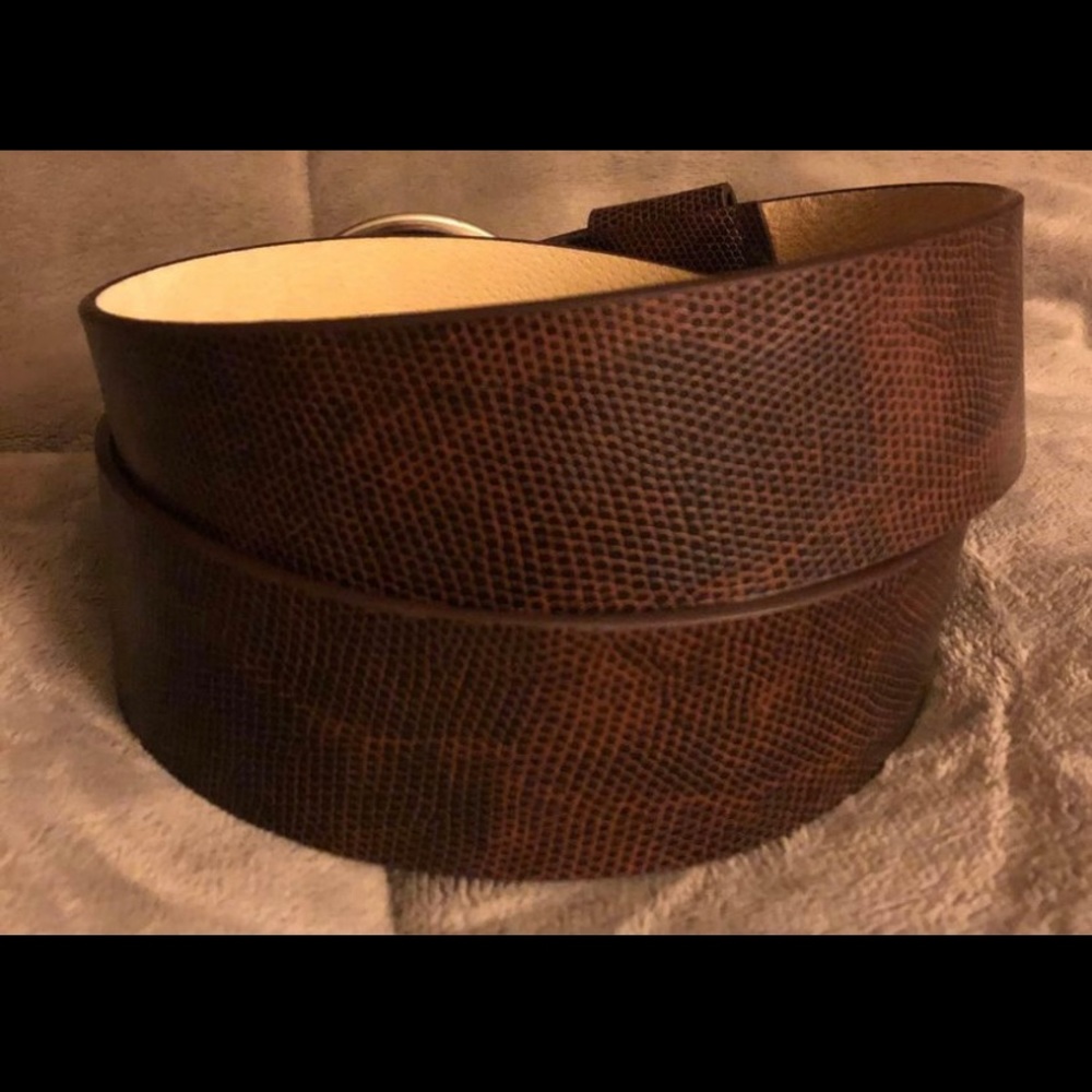 Beautiful leather belt with silver tone buckle.